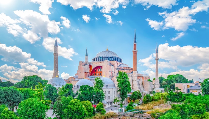 Hagia Sophia exterior with minarets in Eminonu, Istanbul, Turkey, showcasing Byzantine architecture.
