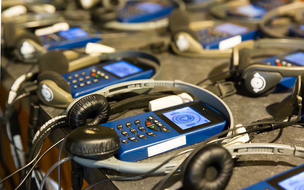 Audio guides and headphones for Amsterdam evening guided cruise.