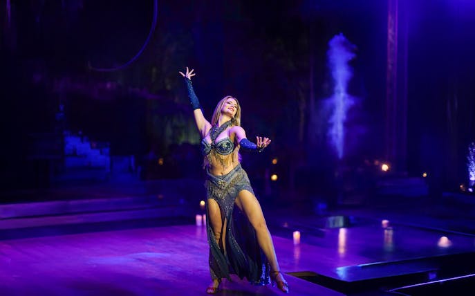 Performer dancing at Nouba Restaurant Dinner Show.