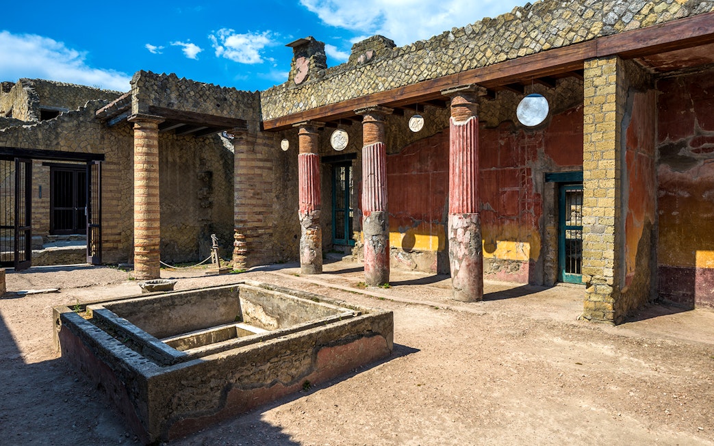 Ancient courtyard with columns at the Ruins of Herculaneum, Italy.