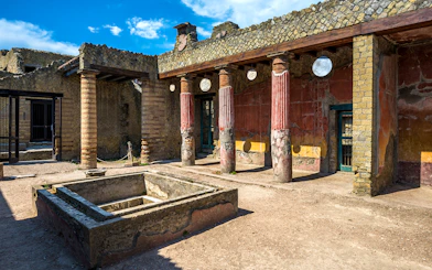 Ancient courtyard with columns at the Ruins of Herculaneum, Italy.