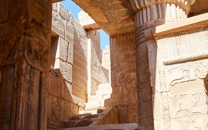 Ancient hieroglyphs and carvings inside the Temple of Deir el-Medina, Luxor's West Bank.