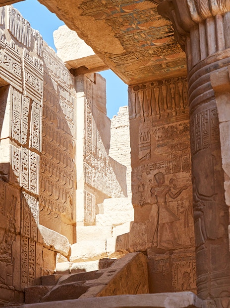 Ancient hieroglyphs and carvings inside the Temple of Deir el-Medina, Luxor's West Bank.