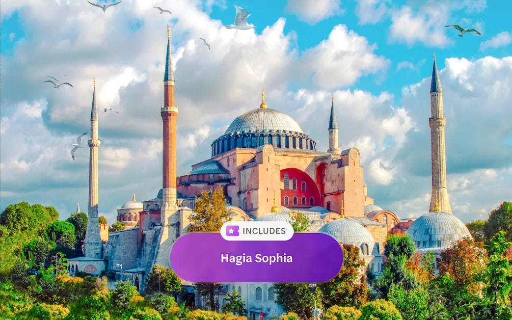 Hagia Sophia Museum with minarets in Eminonu, Istanbul, under a blue sky.