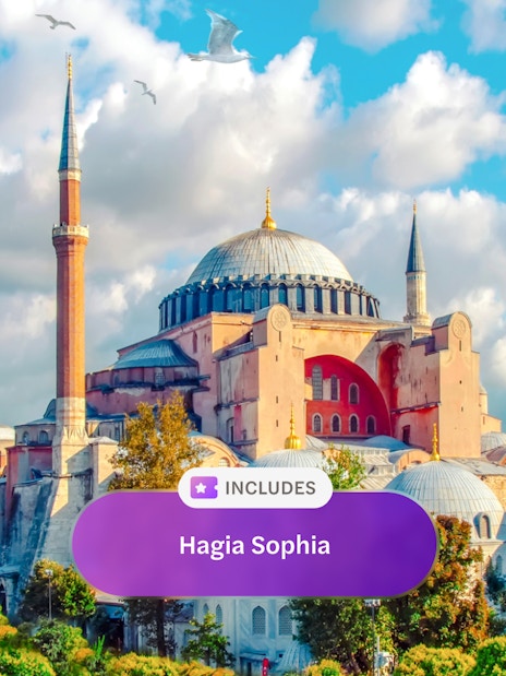 Hagia Sophia Museum with minarets in Eminonu, Istanbul, under a blue sky.