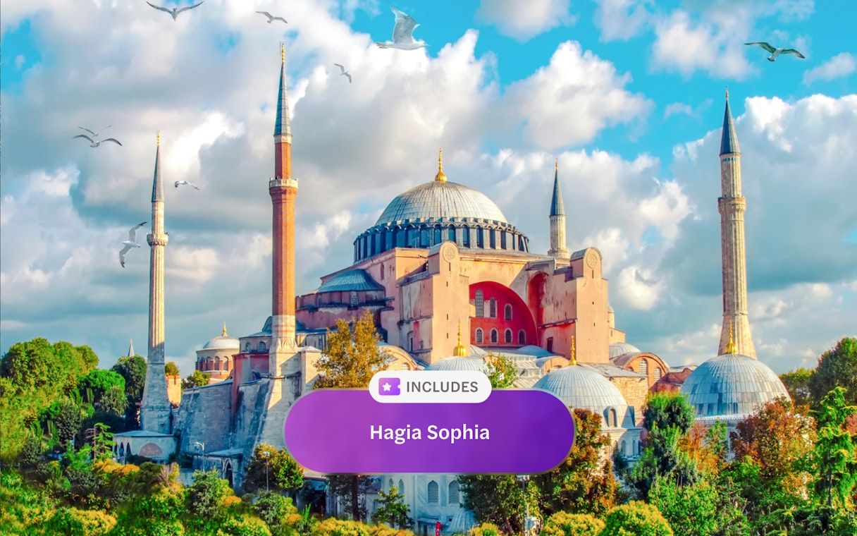 Hagia Sophia Museum with minarets in Eminonu, Istanbul, under a blue sky.