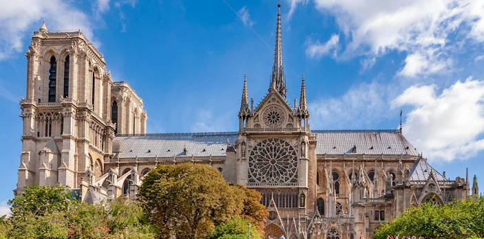 Notre Dame Cathedral exterior with crypt entry, Paris tour.