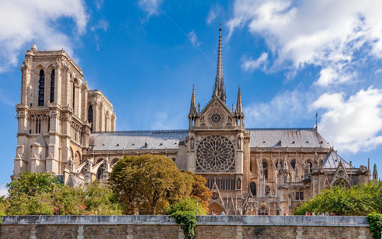 Notre Dame Cathedral exterior with crypt entry, Paris tour.