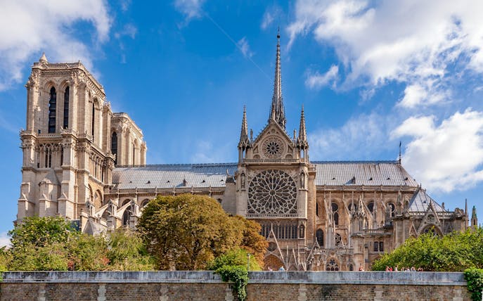 Notre Dame Cathedral exterior with crypt entry, Paris tour.