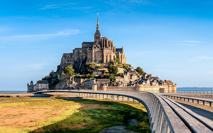 Mont St. Michel Abbey with bridge, viewed from mainland, Normandy, France.