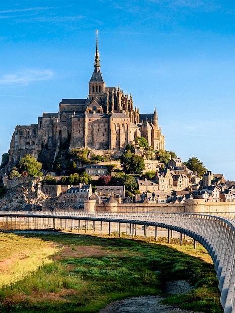 Mont St. Michel Abbey with bridge, viewed from mainland, Normandy, France.