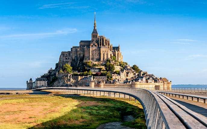 Mont St. Michel Abbey with bridge, viewed from mainland, Normandy, France.