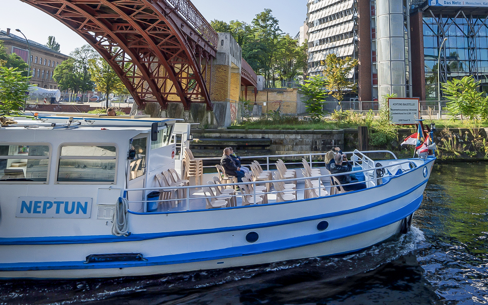 Boat cruising under a bridge on the River Spree during the 3.25-hour tour in Berlin.