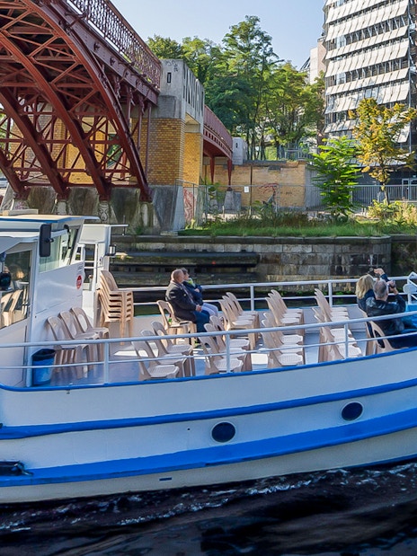 Boat cruising under a bridge on the River Spree during the 3.25-hour tour in Berlin.