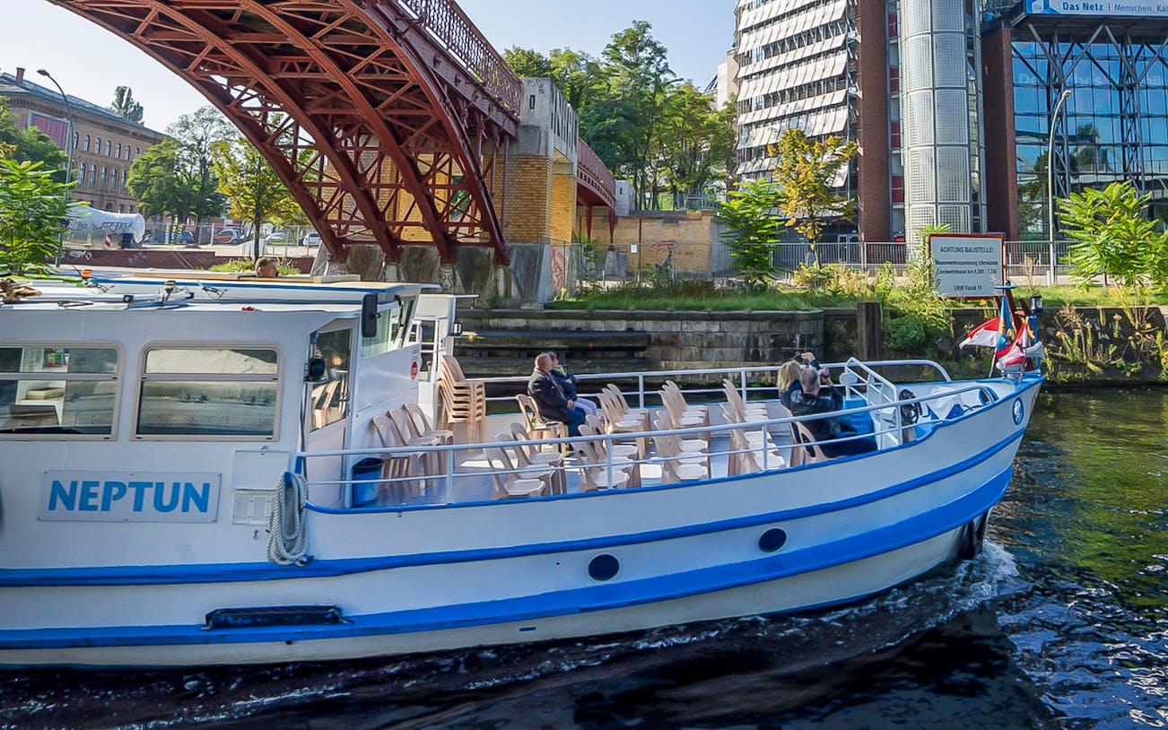 Boat cruising under a bridge on the River Spree during the 3.25-hour tour in Berlin.