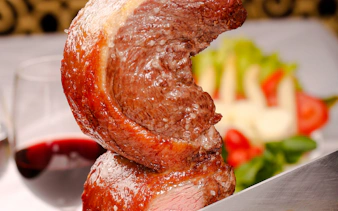 Sliced picanha steak at a Brazilian steakhouse in Rio de Janeiro.