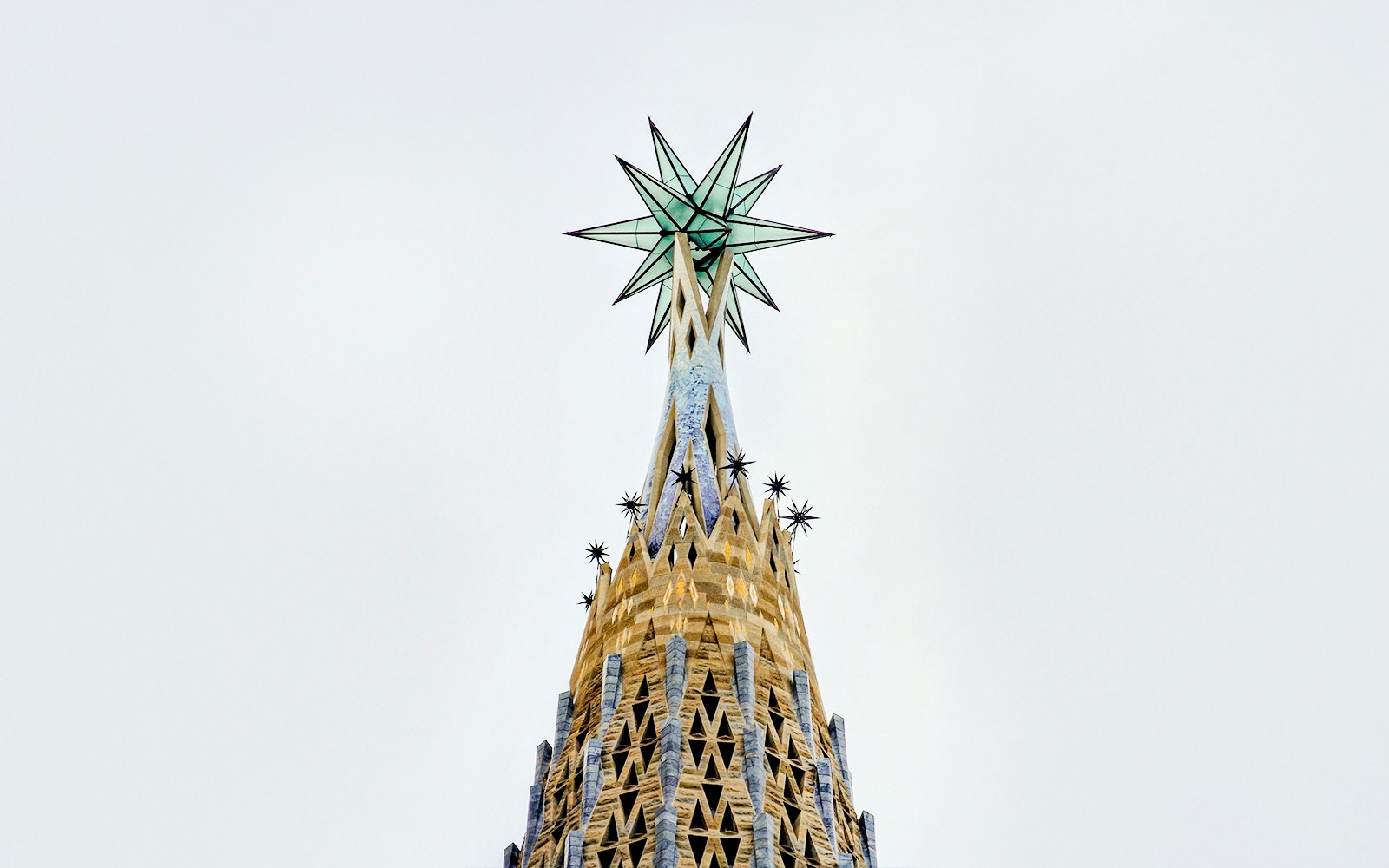 Sagrada Familia's Virgin Mary Tower with intricate architectural details in Barcelona, Spain.