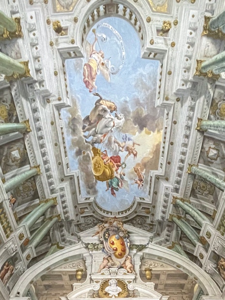 Pitti Palace ceiling frescoes depicting mythological figures in Florence, Italy.