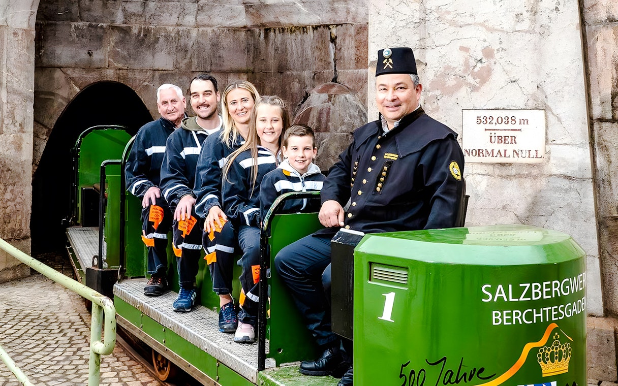 Visitors on a train tour at Berchtesgaden Salt Mine, Bavaria.
