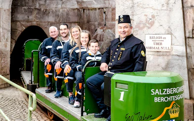 Visitors on a train tour at Berchtesgaden Salt Mine, Bavaria.
