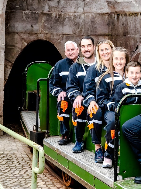 Visitors on a train tour at Berchtesgaden Salt Mine, Bavaria.