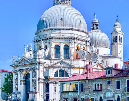 Gondola on Venice canal near Santa Maria della Salute basilica.