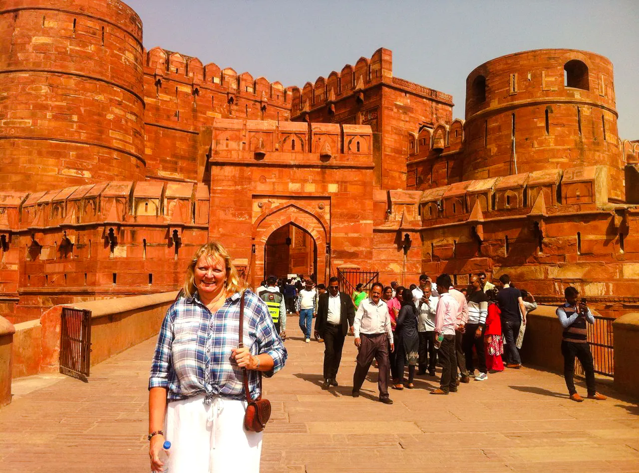 Tourists at Agra Fort entrance during Delhi to Agra tour.