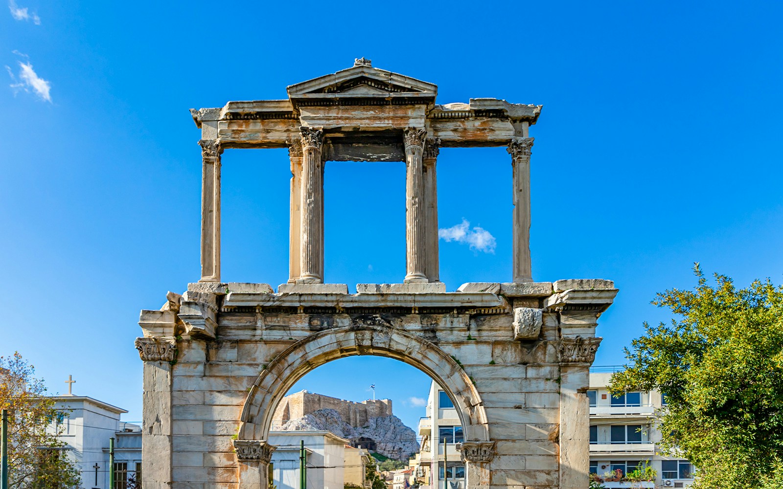 Hadrian’s Arch with the Acropolis in the background, Athens, Greece.