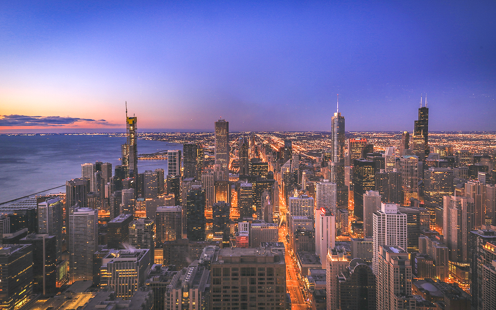 Chicago skyline at sunset from Willis Tower Skydeck.