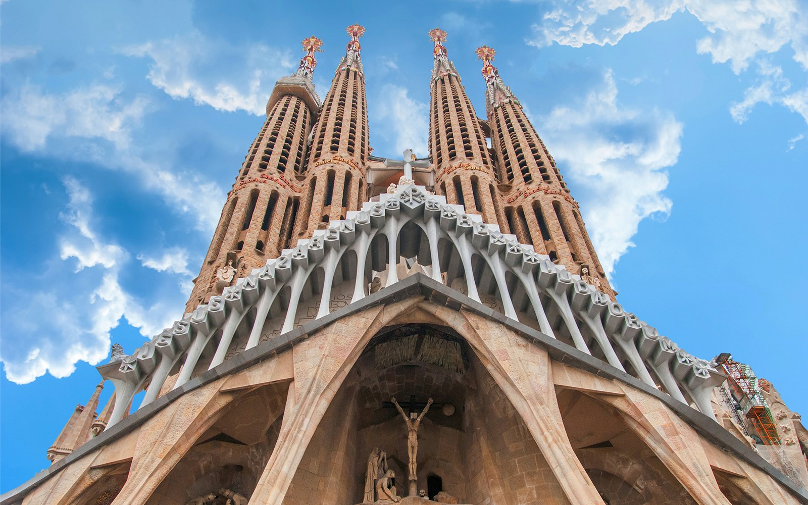 Sagrada Familia exterior with intricate spires and towers in Barcelona.