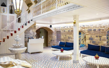 Catmamescit Hamam interior in Beyoglu with traditional decor and seating area.