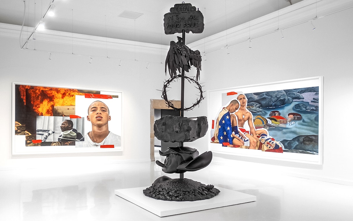 Modern art installation at Moco Museum Barcelona featuring sculptures and vibrant paintings.