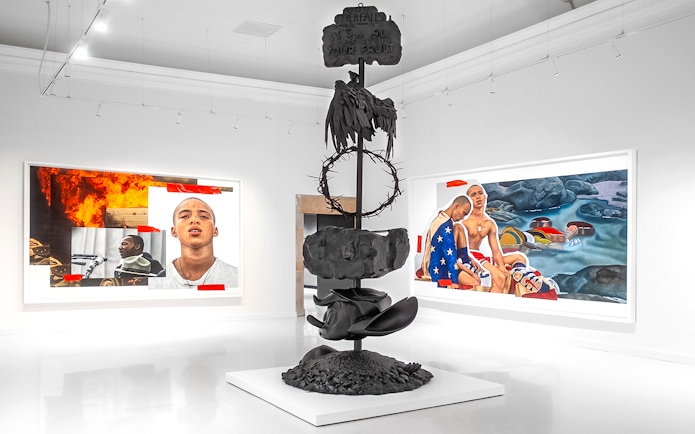 Modern art installation at Moco Museum Barcelona featuring sculptures and vibrant paintings.