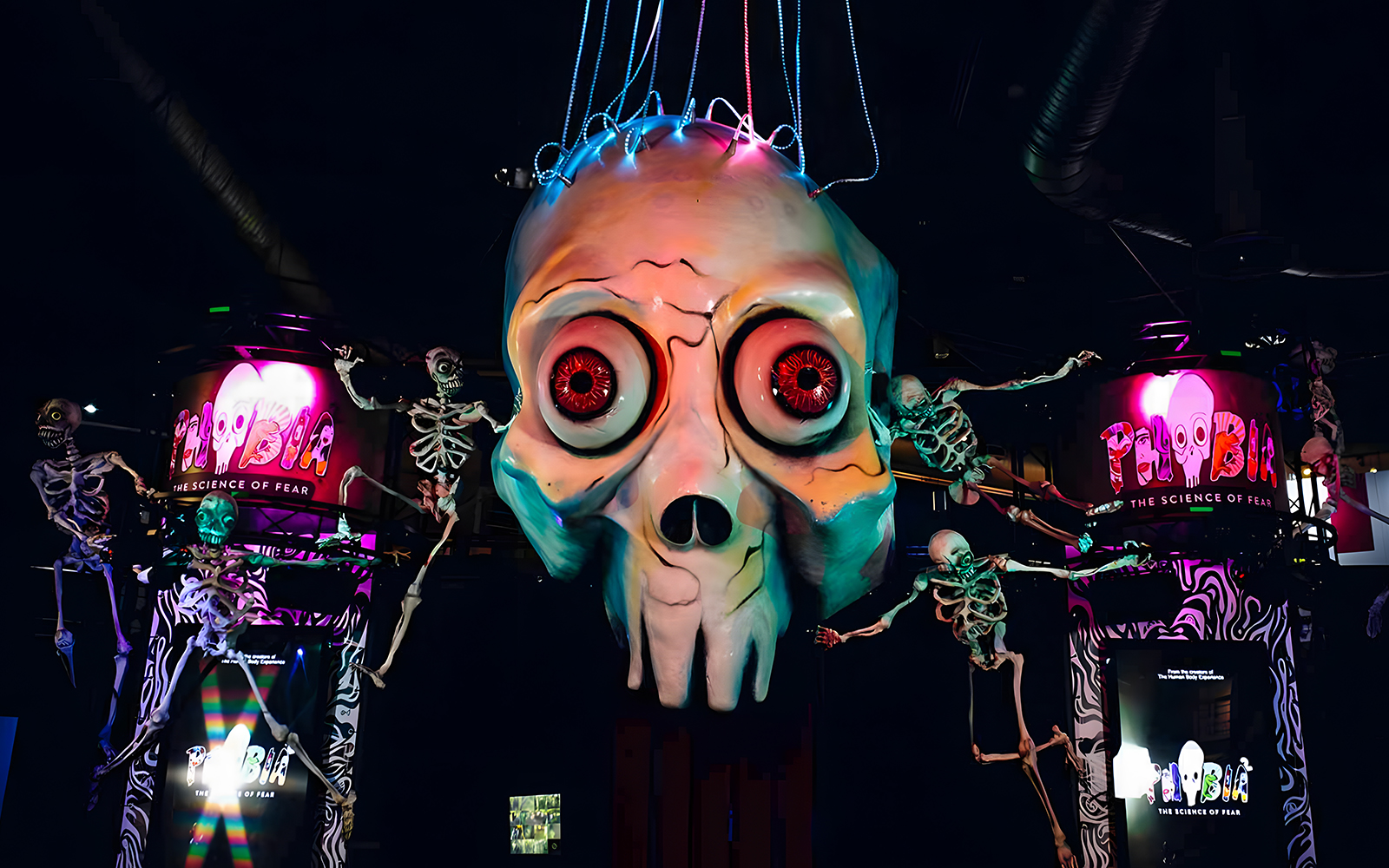 Giant skull and skeletons at Phobia exhibit, Science Centre Singapore.