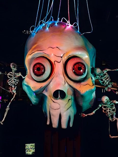 Giant skull and skeletons at Phobia exhibit, Science Centre Singapore.