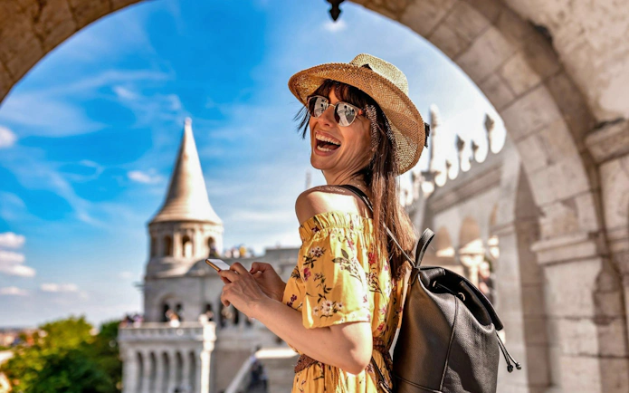 Guest enjoying view at Budapest Fisherman's Bastion during tour.