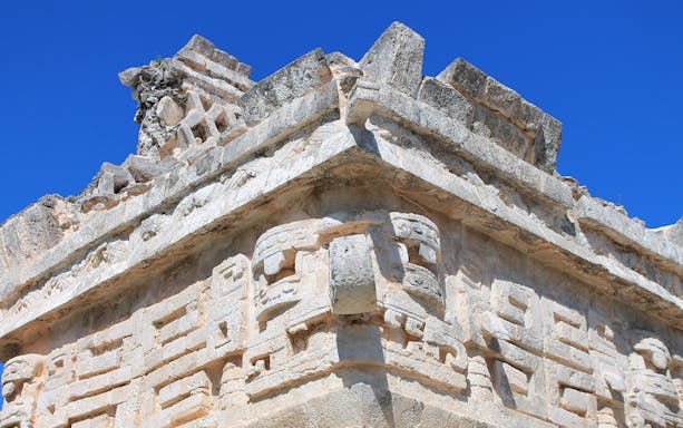 Tulum ruins overlooking the Caribbean Sea on World Wonder Discovery Guided Tour.