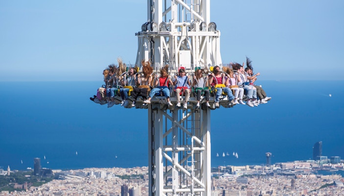 Merlin ride at Tibidabo Amusement Park, Barcelona, featuring a dragon-themed roller coaster.