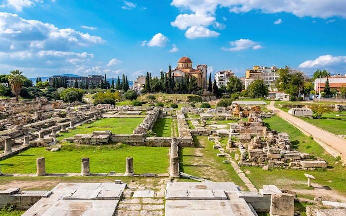 Kerameikos archaeological site with ancient ruins and church in Athens, Greece.