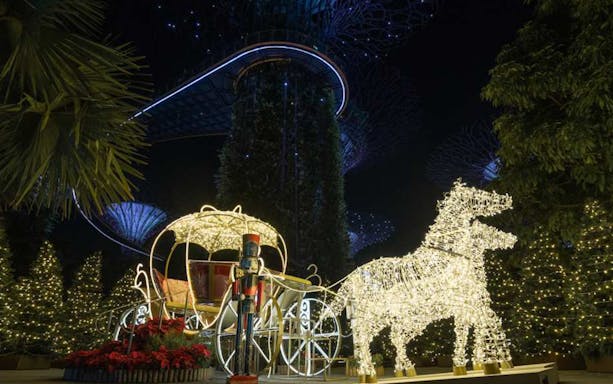 Horse-drawn carriage light display at Christmas Wonderland, Gardens by the Bay, Singapore.