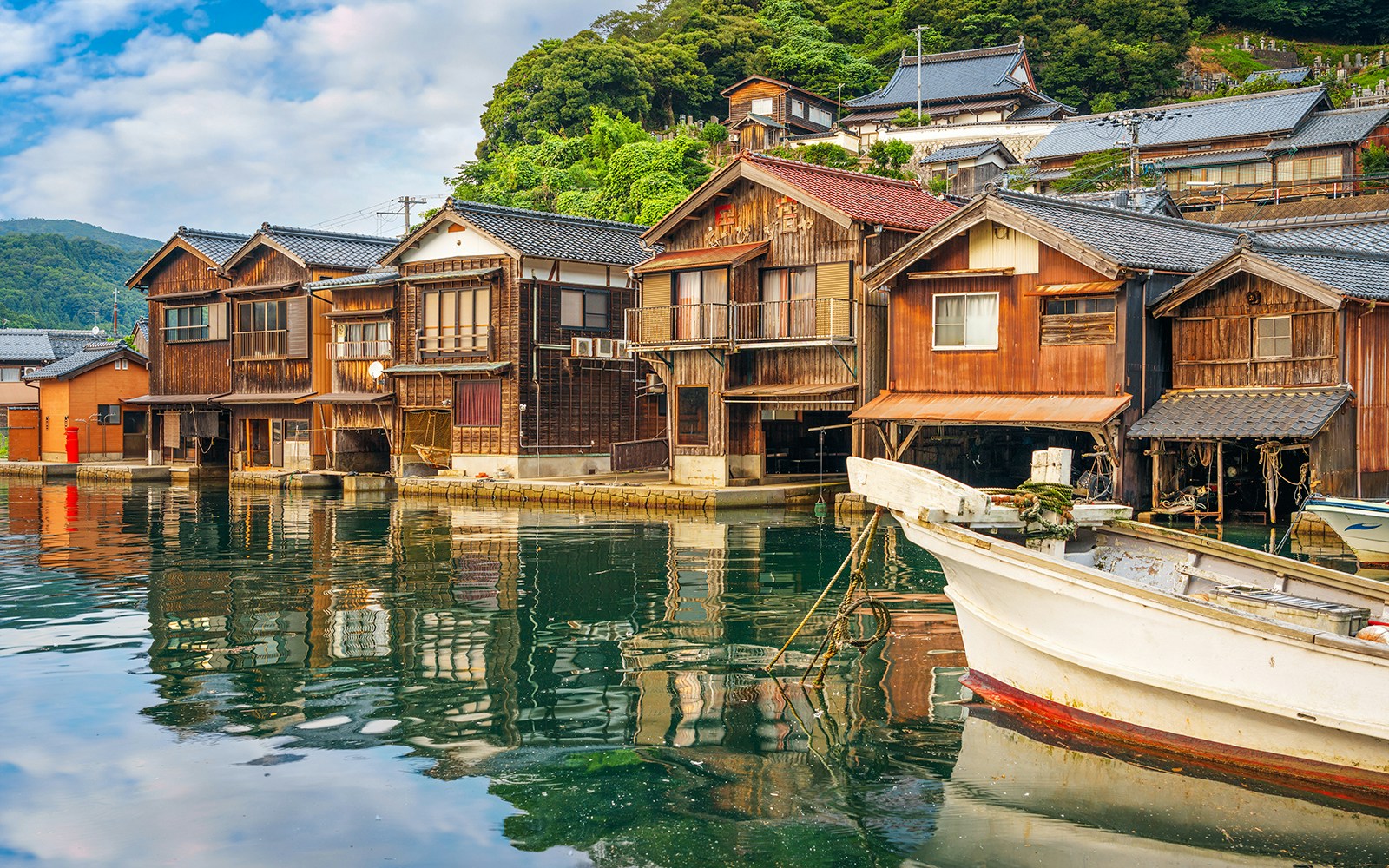 Ine Funaya boathouses along the waterfront on Kyoto Coastal Tour.