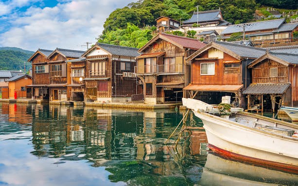 Ine Funaya boathouses along the waterfront on Kyoto Coastal Tour.