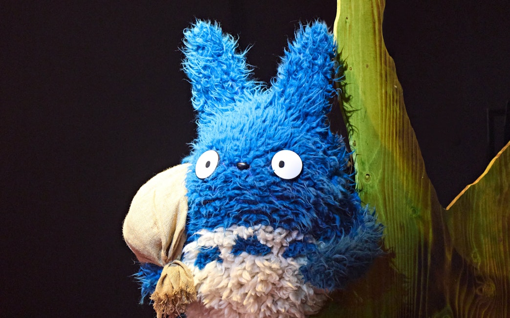 Blue Totoro character on stage at My Neighbour Totoro West End show.