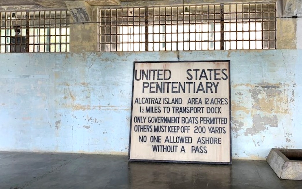 Alcatraz Island penitentiary sign inside historic prison, San Francisco Bay.