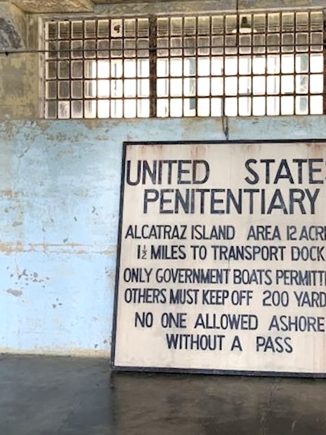 Alcatraz Island penitentiary sign inside historic prison, San Francisco Bay.