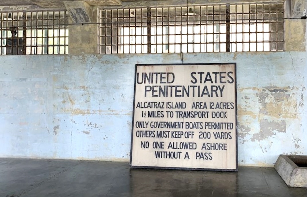 Alcatraz Island penitentiary sign inside historic prison, San Francisco Bay.