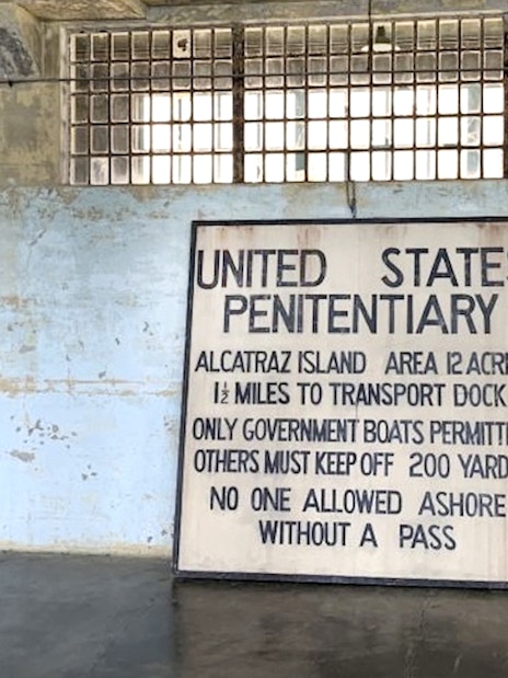 Alcatraz Island penitentiary sign inside historic prison, San Francisco Bay.