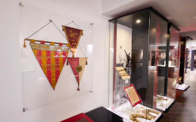 Football banners and memorabilia at Sevilla FC History Experience, Ramón Sánchez-Pizjuán Stadium.