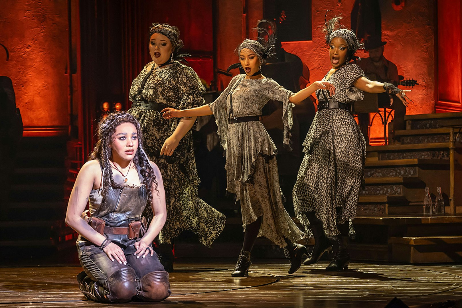 Performers on stage during Hadestown musical.