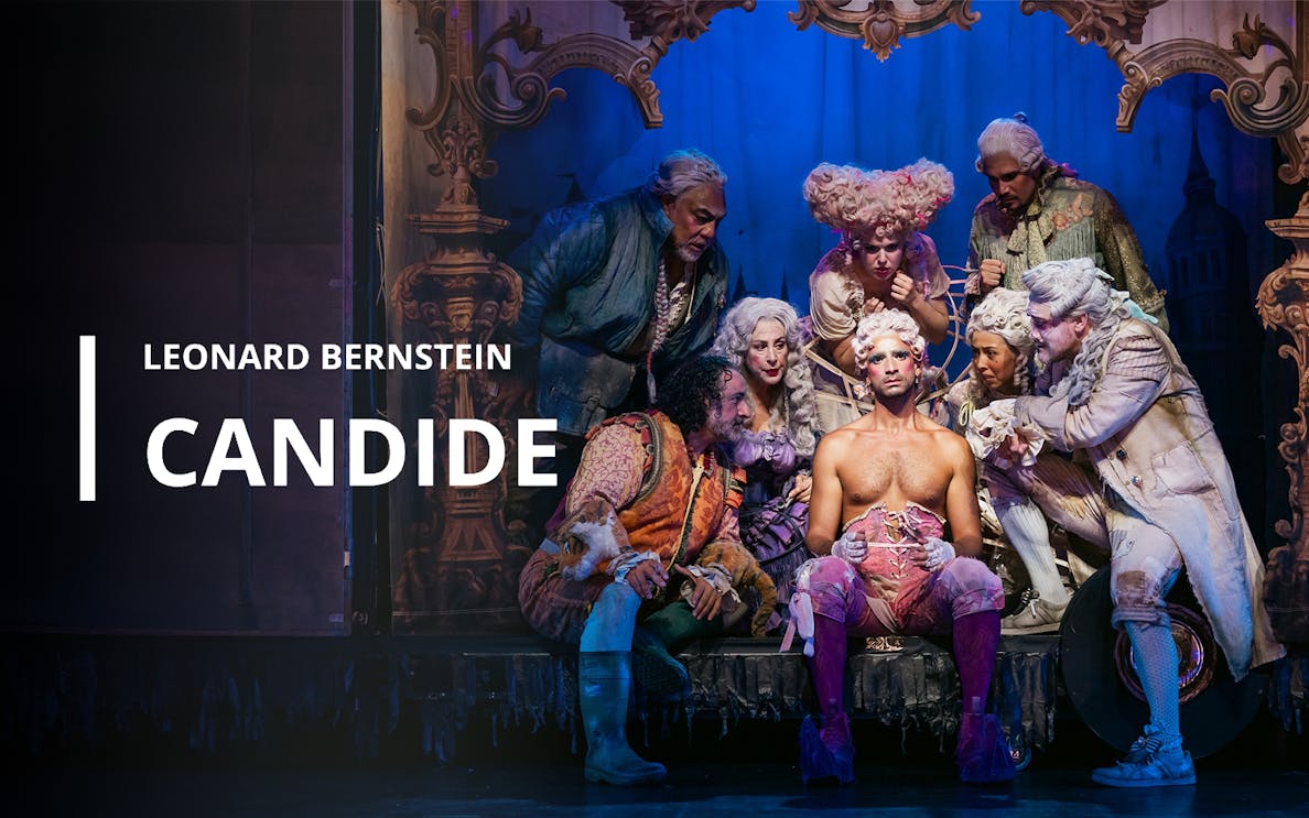 Performers in period costumes on stage during a production of Leonard Bernstein's Candide.